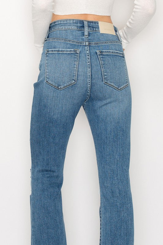 HIGH RISE SKINNY BOOTCUT WITH RELEASE HEM