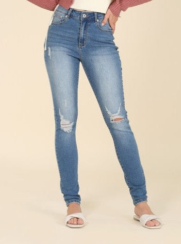 Dark wash distressed skinny jeans